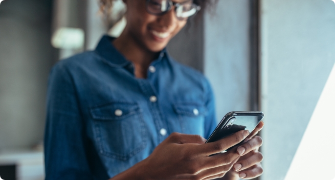 Businesswoman using cell phone